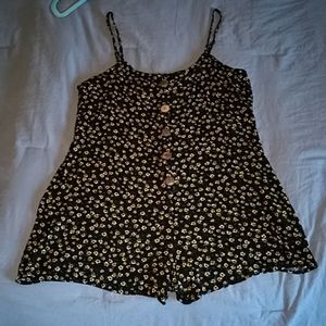 Black with yellow flowers print jumper/ romper.